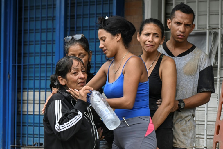 Locuitorii orașului Las Tejerias, Venezuela, sunt afectați de alunecarea de noroi mortală care i-a lovit pe 9 octombrie 2022 (AFP - Yuri Cortez)